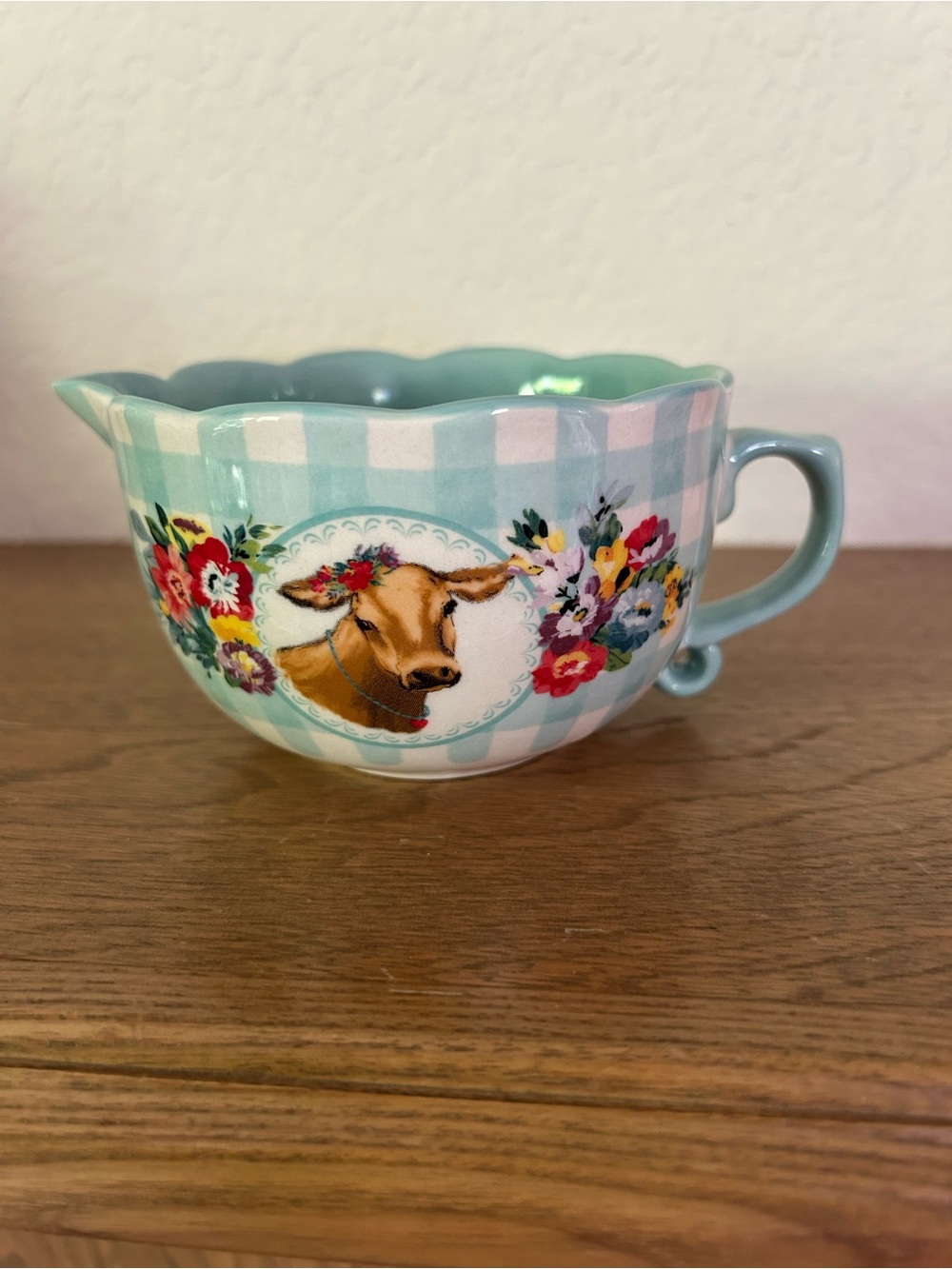 pioneer Woman Floral Cow one cup measuring ceramic with handle.
